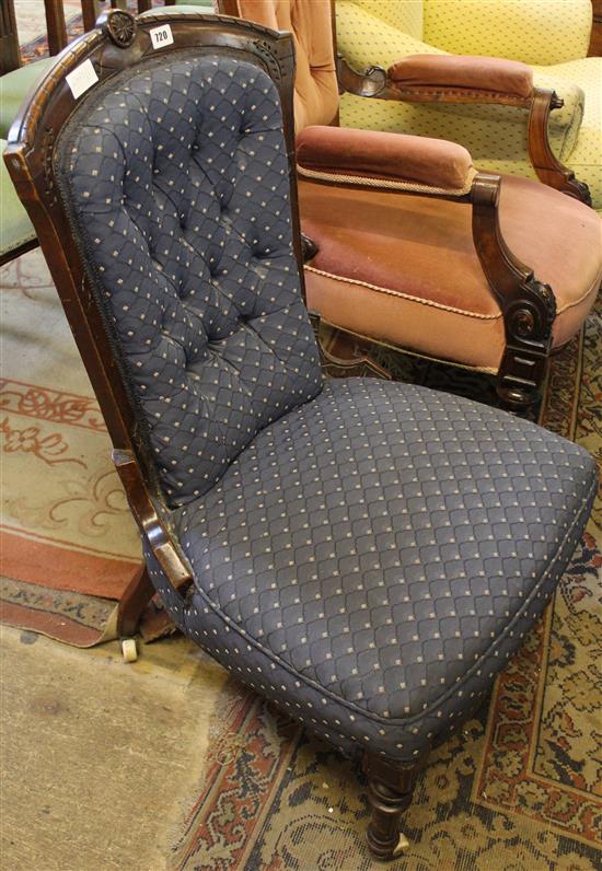 Victorian carved walnut nursing chair with blue buttoned upholstery